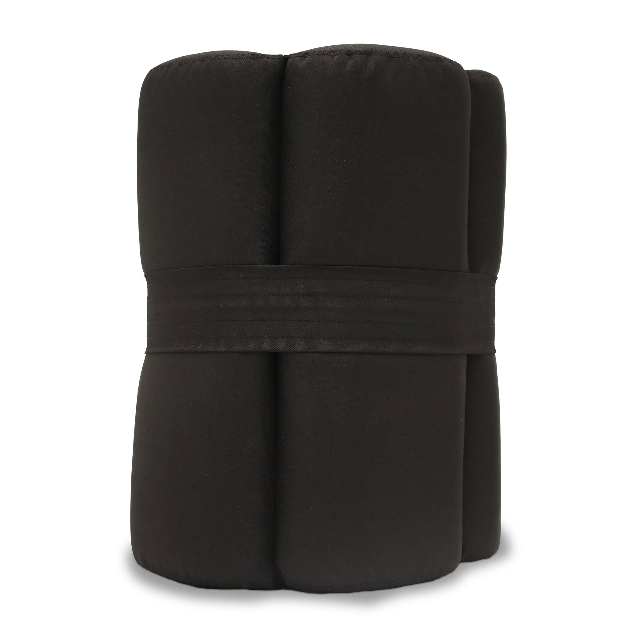 Le Coussin EXOCET by Humble Nature se tient droit sur un fond blanc uni, sa forme noire soigneusement pliée et sécurisée par une bande assortie, clin d&