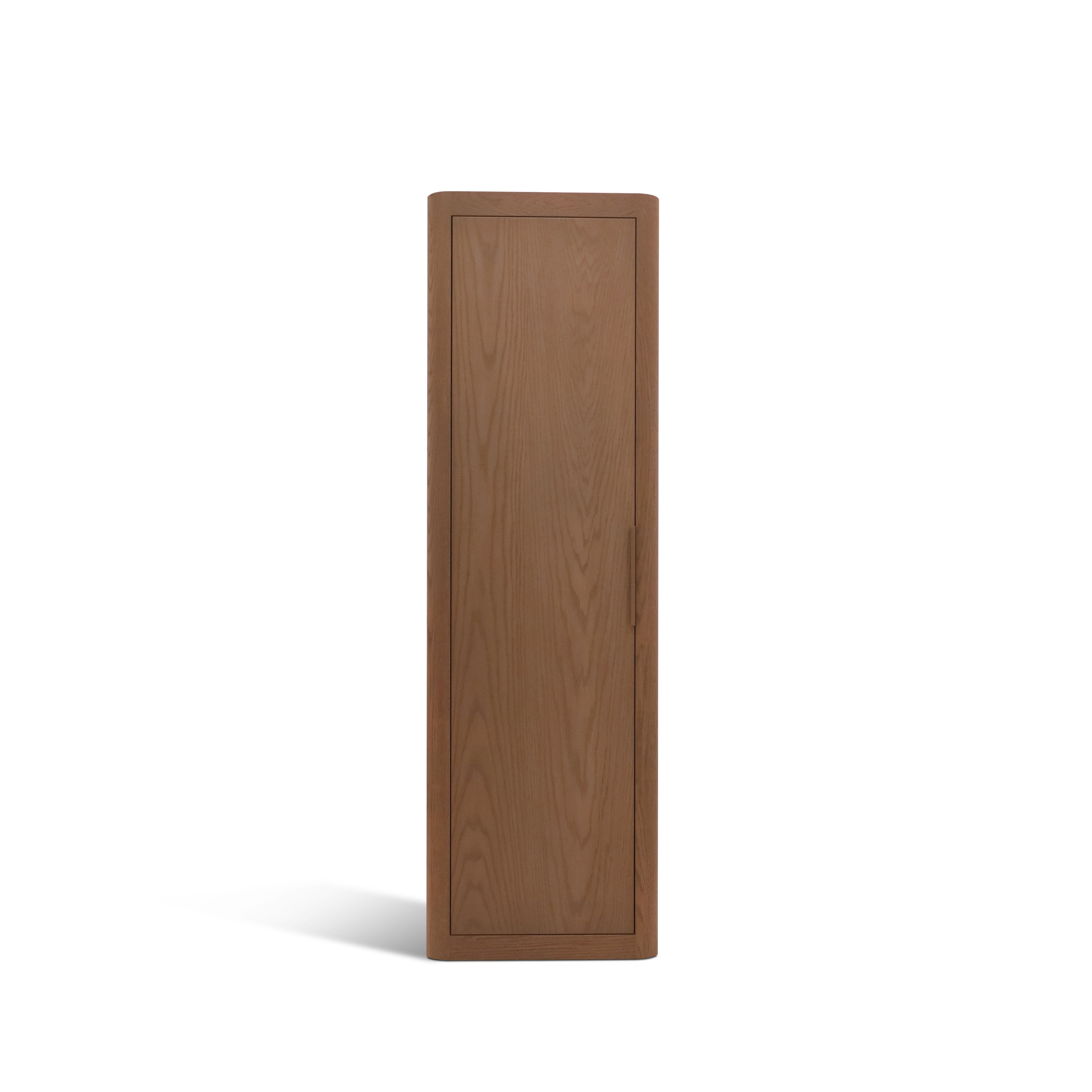 Le Cabinet simple Origin | SADDLE de Humble Nature est un meuble haut et étroit en bois massif de chêne rouge avec une seule porte et un design authentique minimaliste, présenté debout sur un fond blanc - un ajout raffiné aux cabinets et commodes.