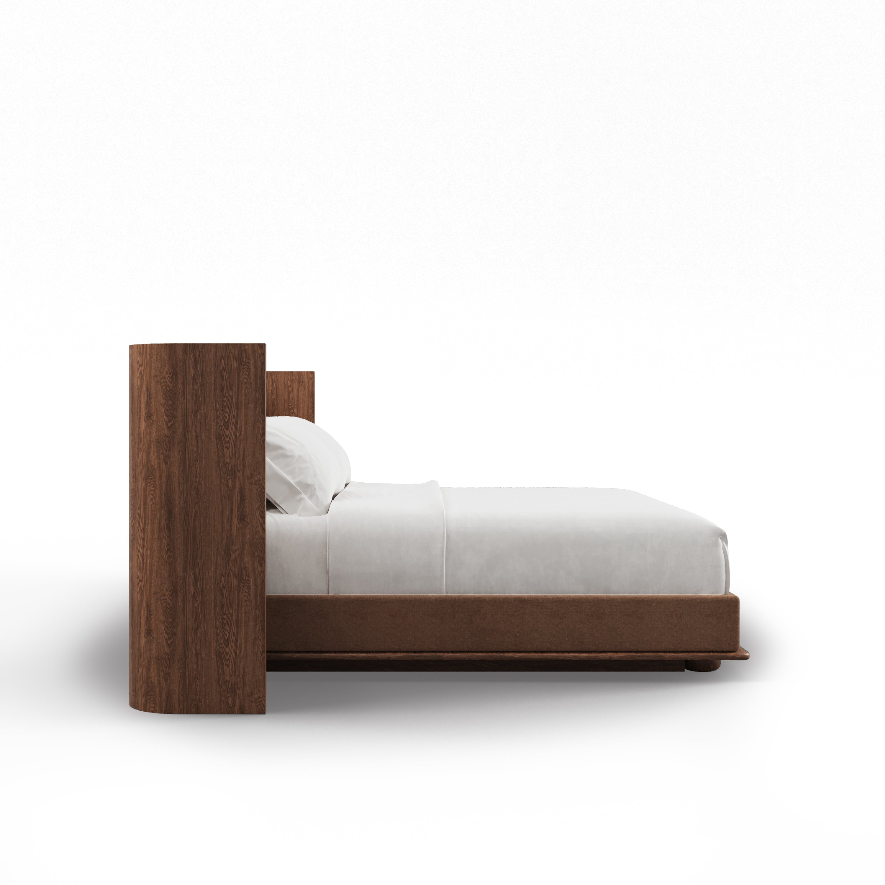 Vue latérale du Lit Essence | Pecan de Humble Nature Design, avec une tête de lit haute et incurvée en bois de pécan, une literie blanche et une base marron basse, incarnant le luxe et l&