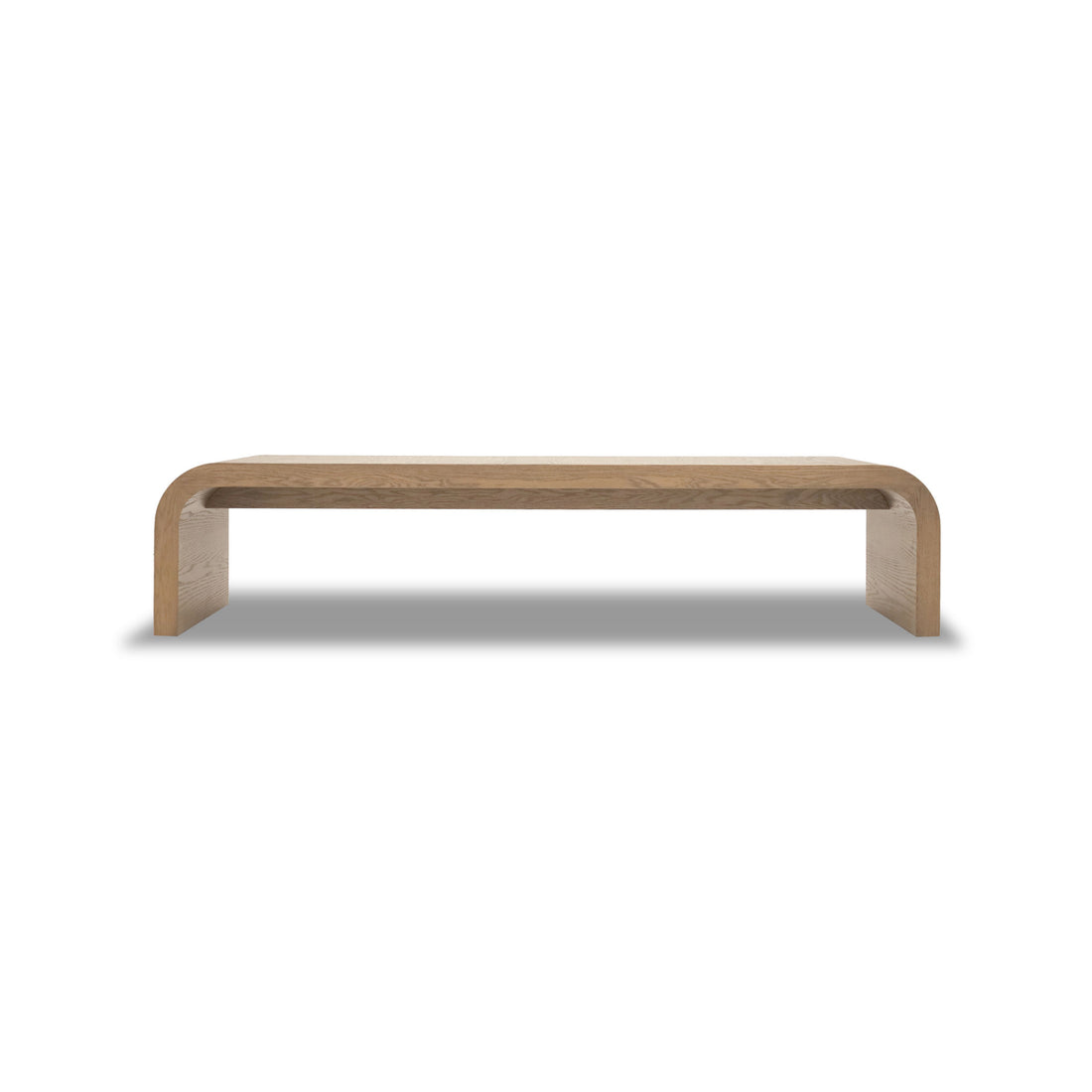 Le Banc 80 en bois Essence de Humble Nature est un banc minimaliste en bois massif de chêne rouge. Il présente des bords arrondis et une finition lisse, mettant en valeur son esthétique épurée avec un plateau rectangulaire simple et des pieds courbés qui se fondent parfaitement sur un fond blanc uni.