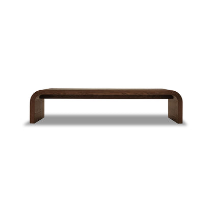 Un banc en bois épuré et minimaliste en PECAN aux bords arrondis et à la finition lisse, sur fond blanc uni. Le Banc 80 en bois Essence de Humble Nature est robuste et contemporain dans son design.