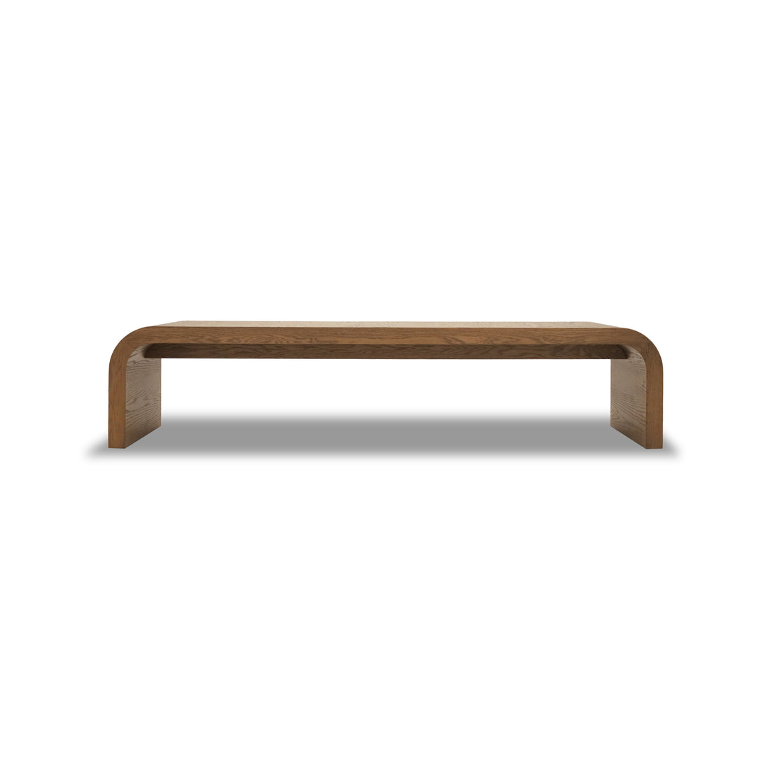 Le Banc 80 en bois Essence de Humble Nature, fabriqué en bois massif de chêne rouge, présente un design minimaliste avec une finition lisse et des bords incurvés sur un fond blanc uni.