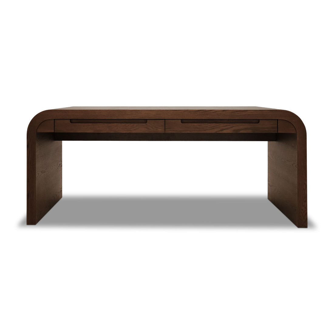 La table de travail Essence │ PECAN de Humble Nature est un bureau rectangulaire moderne en chêne massif avec des coins arrondis et deux tiroirs avant, présenté sur un fond blanc uni.