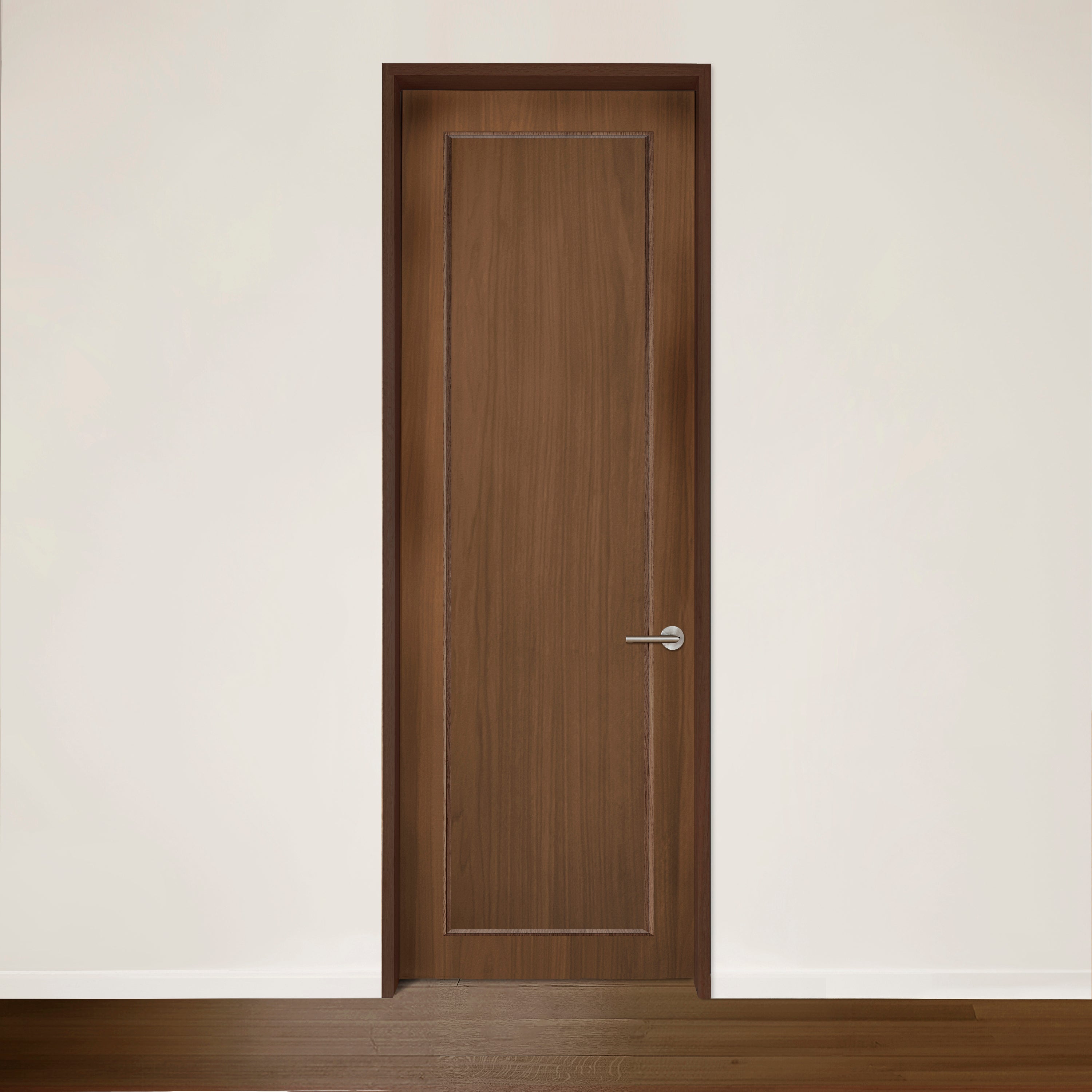 La Porte CONTOUR en noyer minimaliste de Humble Nature met en valeur lélégance intemporelle avec son design en bois fermé, sa poignée argentée et son cadre rectangulaire. Placé contre un mur blanc et un sol marron, son motif de grain de bois plus foncé met en valeur la durabilité accrue.