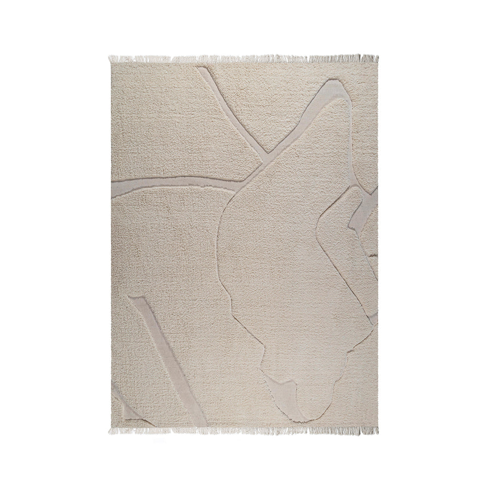 Tapis de laine tissé à la main beige | VANILLA de Humble Nature, aux motifs géométriques abstraits et aux bords frangés. Son design texturé présente des zones en relief et en creux sur un fond blanc pour une esthétique subtile et artistique.