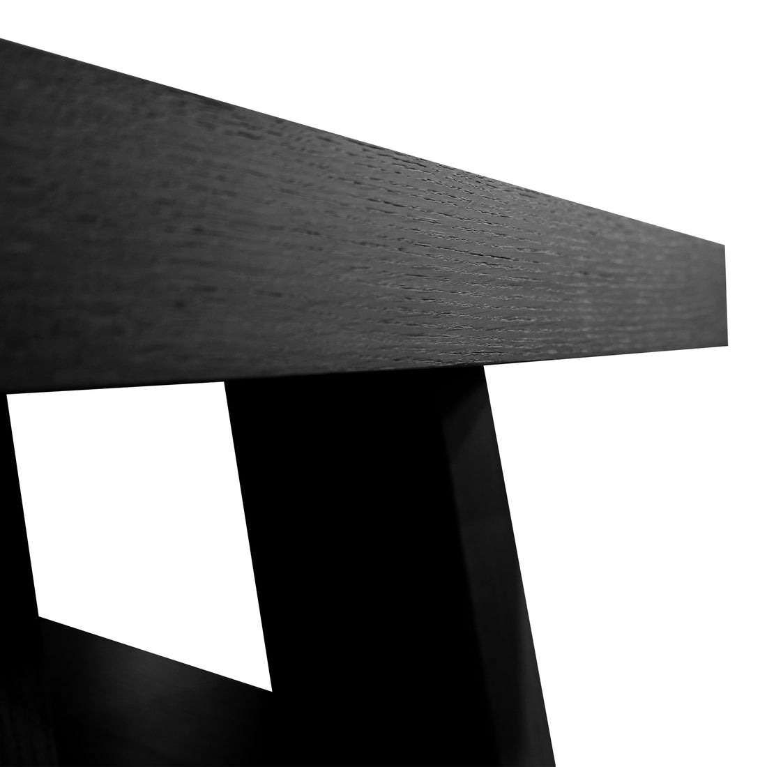 Gros plan dune console de table minimaliste en bois Origin | ONYX par Humble Nature. Limage montre une vue en perspective, mettant laccent sur la texture lisse et les lignes épurées qui mettent en valeur son design moderne sur un fond blanc.