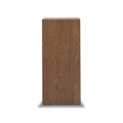 Une table piédestal rectangulaire en bois de la collection Humble Nature&