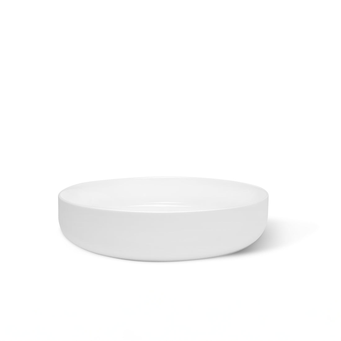 Un bol rond en céramique blanc et épurée de le bol  en céramique | Ensemble de 6 de Humble Nature est présentée sur un fond blanc uni. Cette pièce de vaisselle en céramique présente un design minimaliste et une couleur blanche.