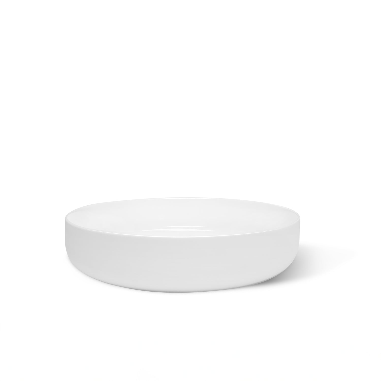 Un bol rond en céramique blanc et épurée de le bol  en céramique | Ensemble de 6 de Humble Nature est présentée sur un fond blanc uni. Cette pièce de vaisselle en céramique présente un design minimaliste et une couleur blanche.