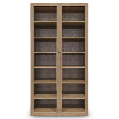 Larmoire double fini Authentik | Porte verre de Humble Nature est une armoire de collection haute en bois avec deux portes en verre. Elle comporte plusieurs étagères vides et présente une finition marron clair naturelle avec placage de chêne rouge dans un design simple et moderne.